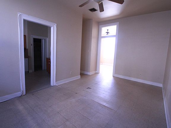living room looking into kitchen and bedroom 1