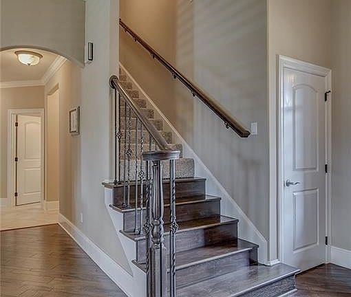 Drop your coat off at the front door before heading up to the 4th bedroom. There is walk-in attic access and two storage rooms just off the full bath.  No need to have a pull down staircase here!