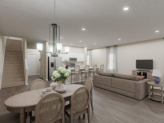 Downstairs, enjoy a spacious, open living area Artist s rendering