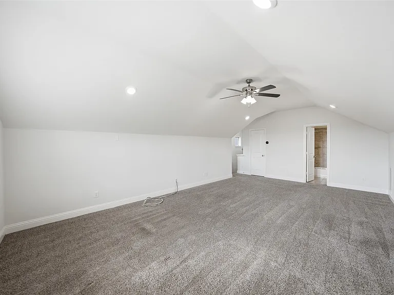 This can be an extra bedroom which has a closet, windows, and a FULL bath.