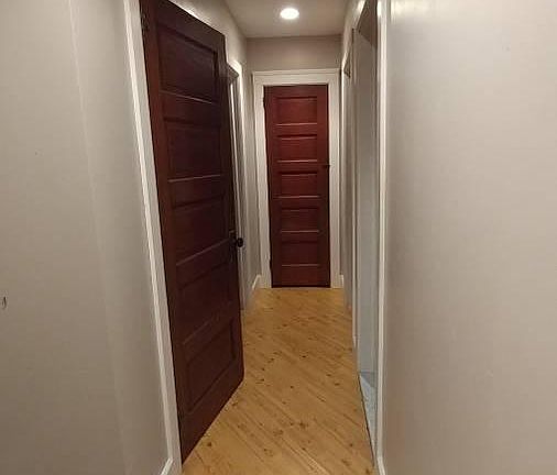 Hallway to bedrooms 1 and 2. Bathroom on the right.