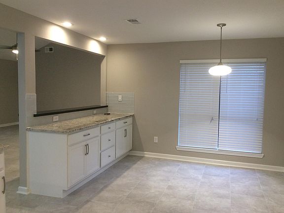Breakfast area with extra cabinets for storage.