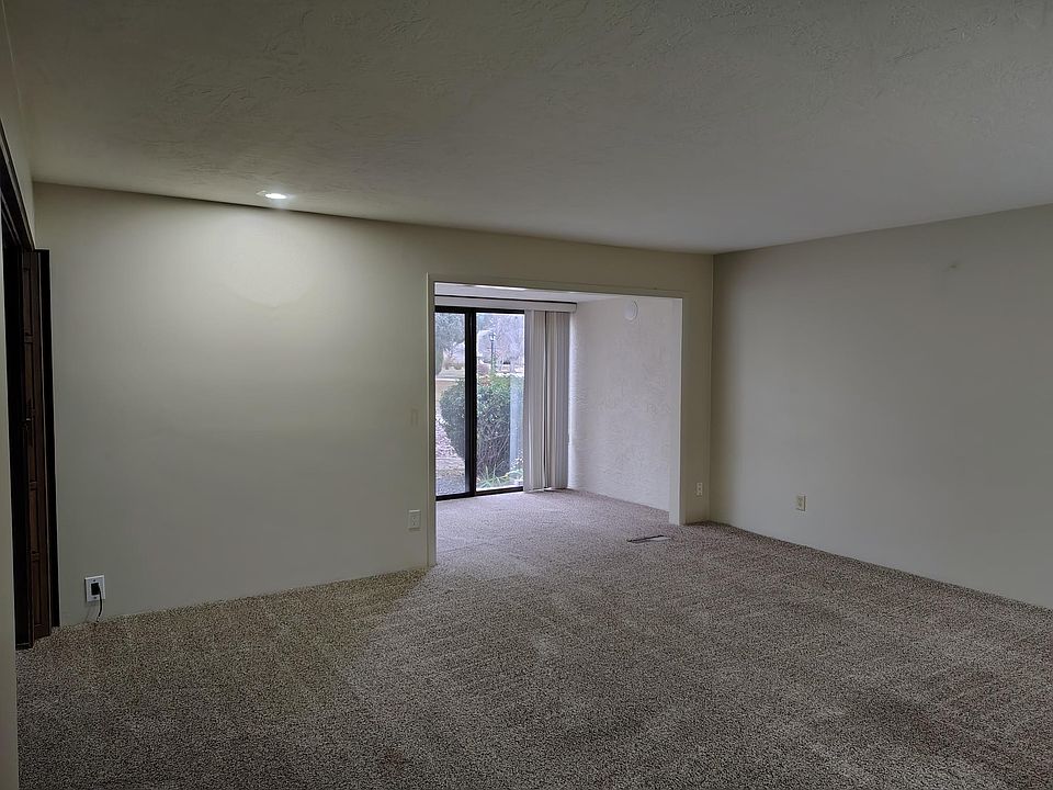 Living room and sunroom/dining area taken from northwest corner of living room