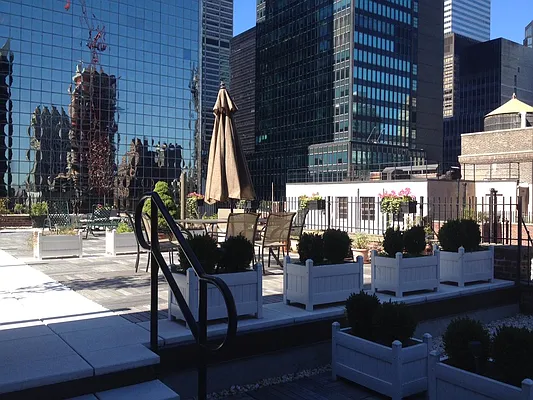 Sold by Douglas Elliman | media 18