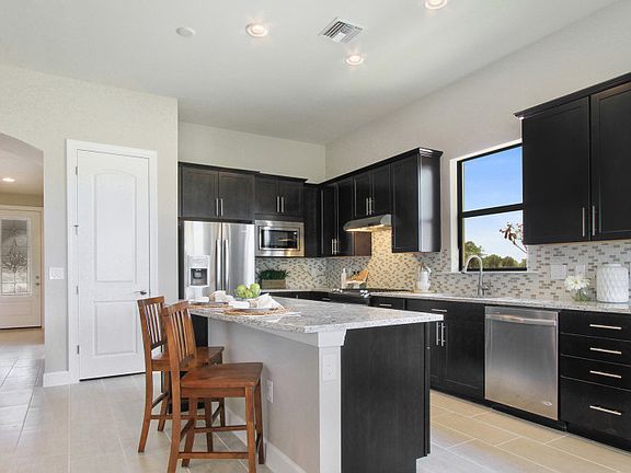 Model Representation Kitchen with center island, providing extra seating options when entertaining