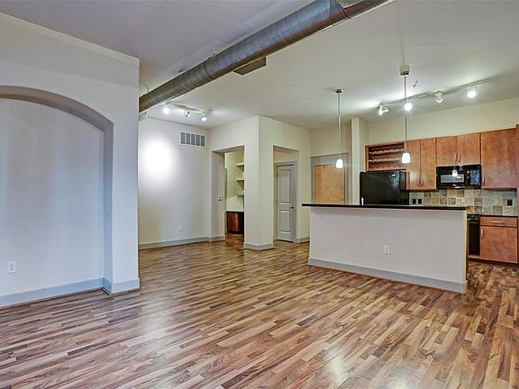 Open concept living, dining and kitchen combo