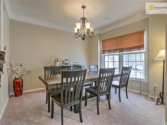 Formal dining room is perfect for entertaining. Fresh paint and new carpet, too!