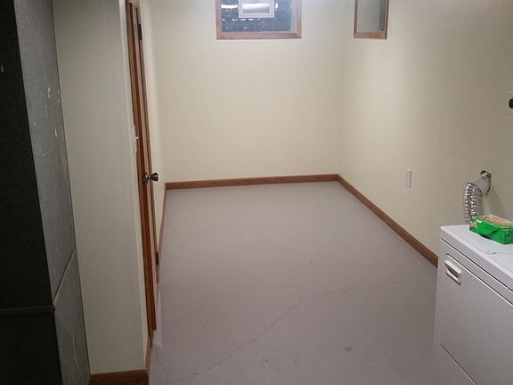 Partially finished basement and laundry room