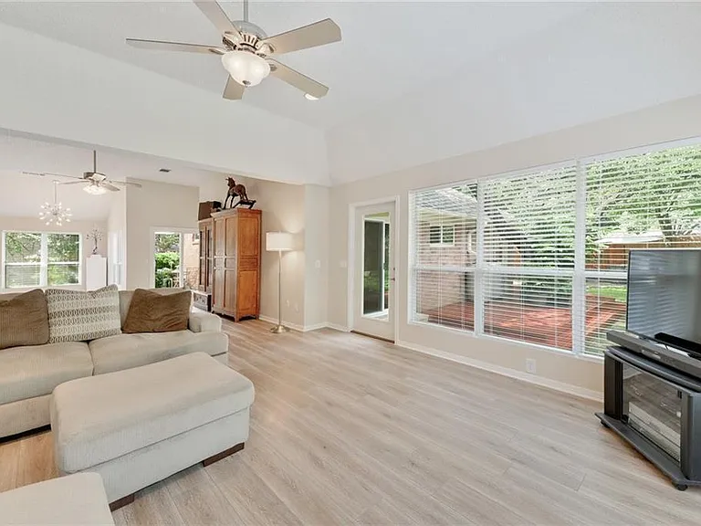 Tall vaulted ceiling throughout the house.