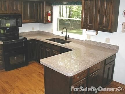 Family room fireplace with woodburning insert