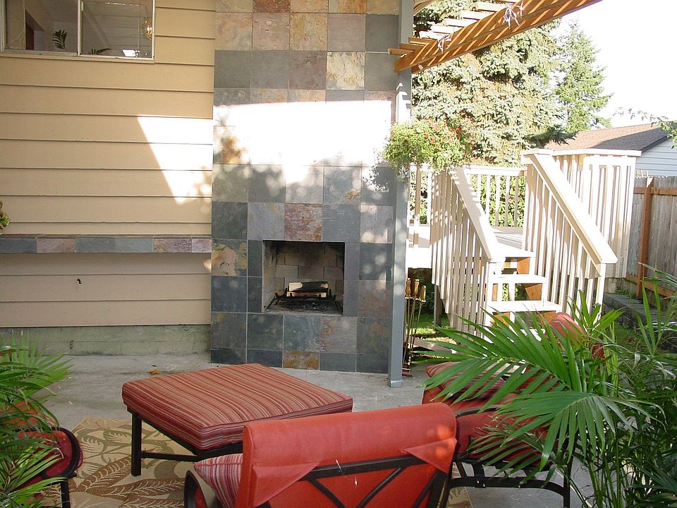 Private patio with slate fireplace