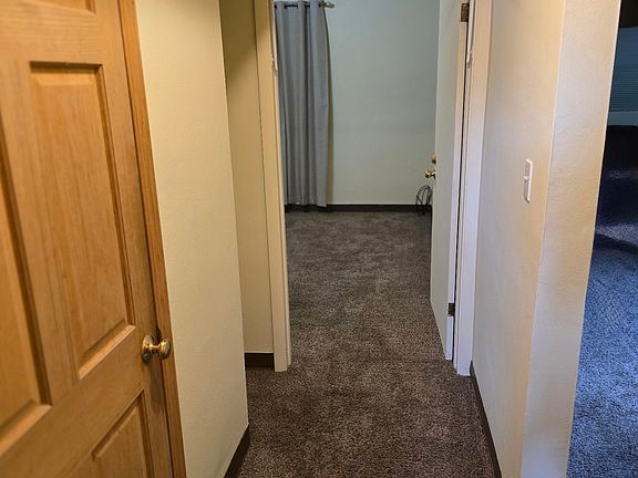 Hall between bedrooms, with hall closet