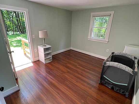 Master bedroom, fits king size bed, closet, deck to backyard, wooded views, luxury vinyl plank