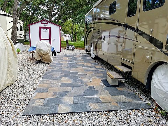 Italian tile patio, storage bldg