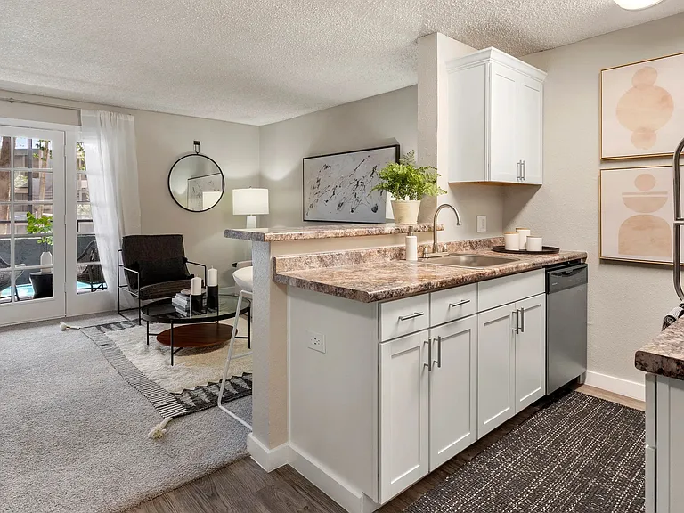 Savor the excitement of cooking in our fully-equipped galley kitchens, modern and perfect for your inner chef.