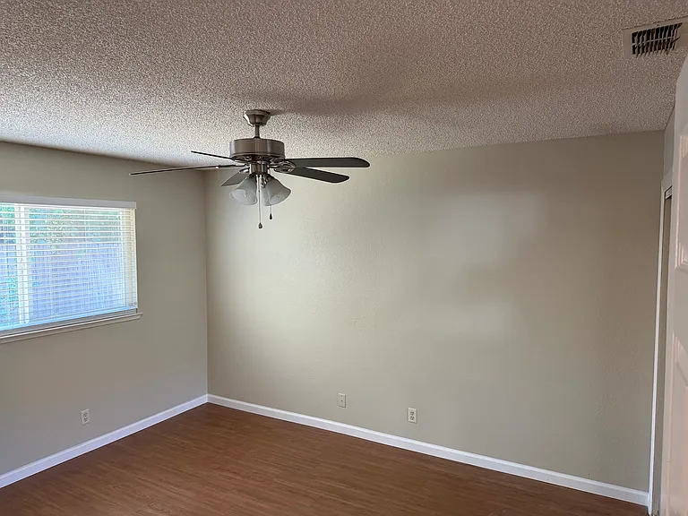 Larger Bedroom 1
