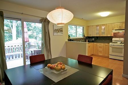 Dining room overlooking deck and kitchen