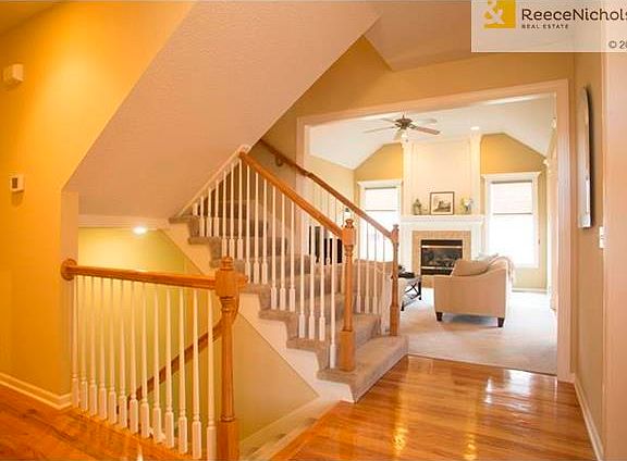 Sparkling hardwood floors in front entry, hall and kitchen.