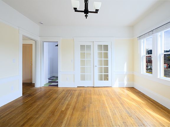 Studio facing closet and kitchen entry