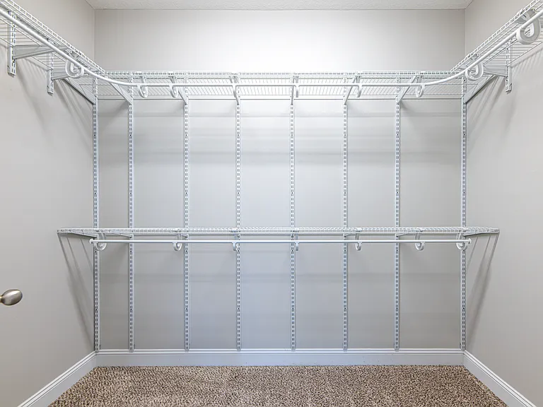 Master walk-in closet with ample space for your wardrobe