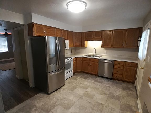 New floor and fridge in kitchen