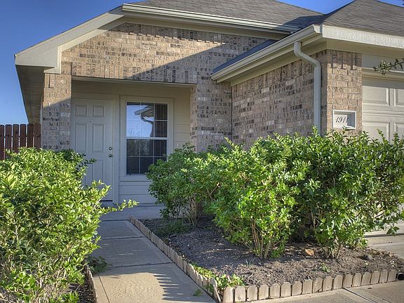 Almost new home with a cozy entry and great landscaping.