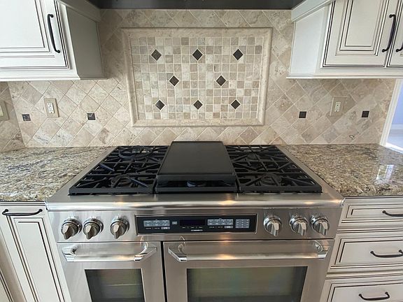 Stove with double oven