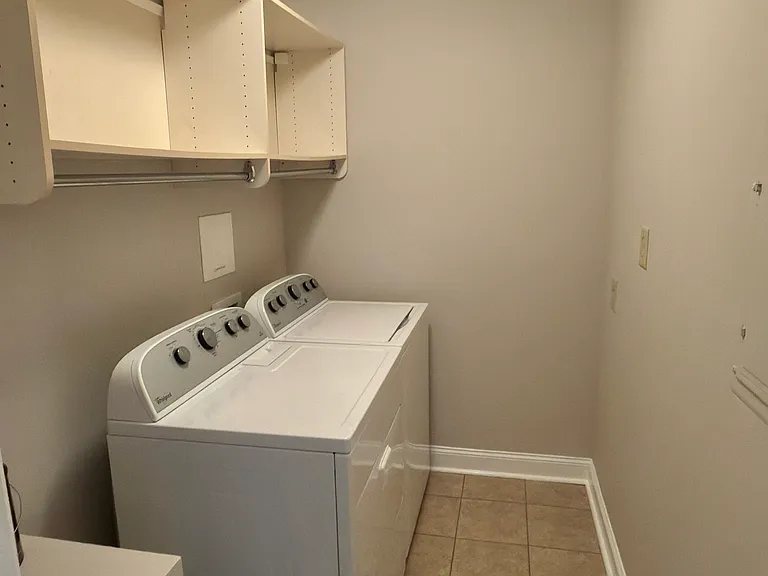 In unit laundry room, washer and dryer included
