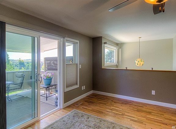 New window in entry way!  Mid Century original lighting in entry way.