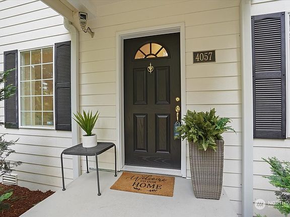 Clean and inviting covered porch entry>