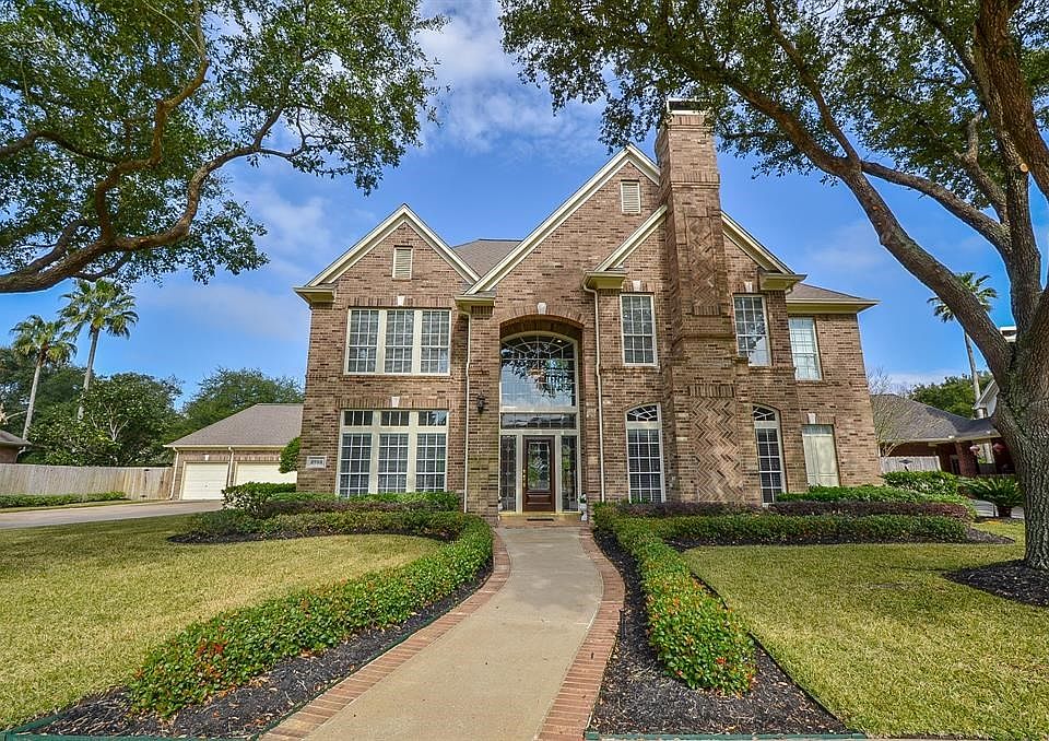 Welcome to Cinco South Lake Village and this gorgeous home. Curb appeal plus. Mature trees, tailored landscaping and inviting home!