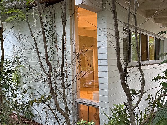 Side yard in front of your private drive way