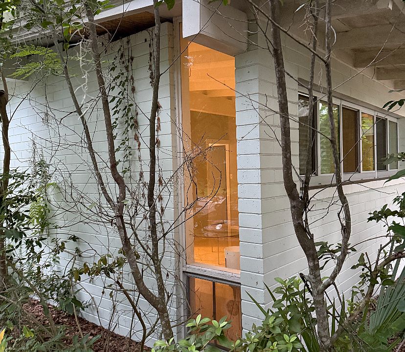 Side yard in front of your private drive way
