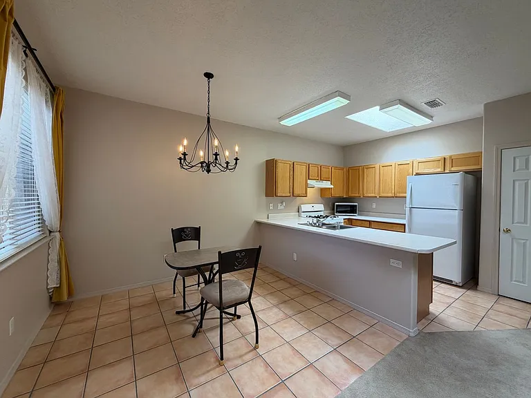 4516 Holiday Breeze Pl NE — Photo 3