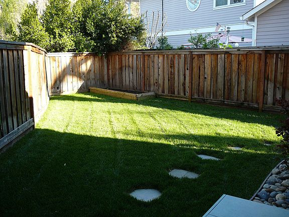 Huge Double-Sized Lot Landscaped with Grass and Sprinkler System