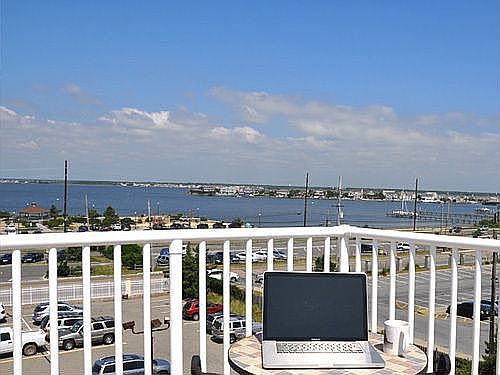 New brick paver rooftop patio with amazing views of the ocean and bay.