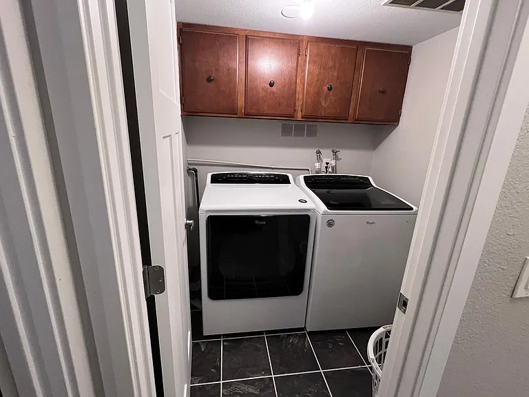 Laundry Room with large capacity washer and dryer