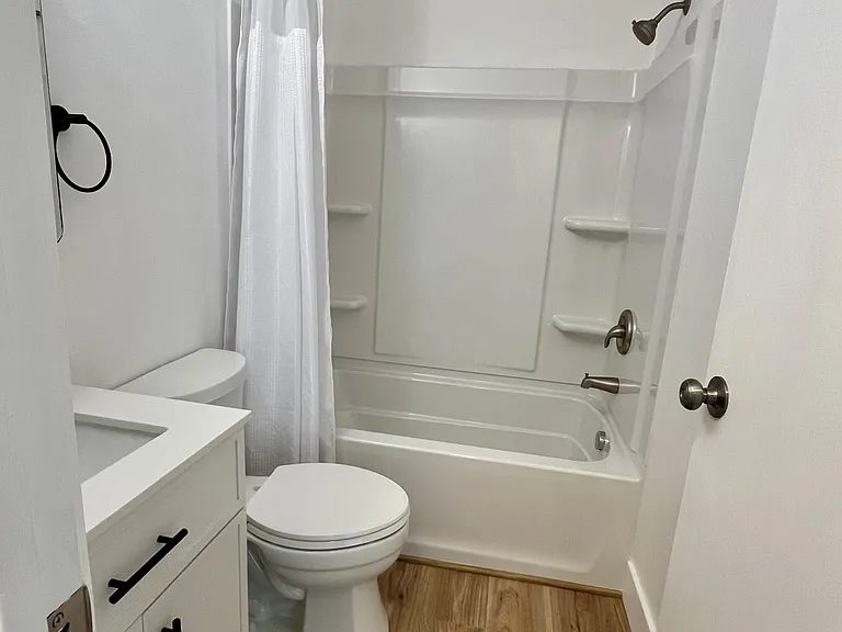 Fully remodeled bathroom including new shower/tub combo; new toilet and vanity