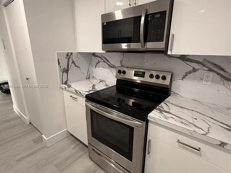 8240 SW 210th St #203 — Photo 1