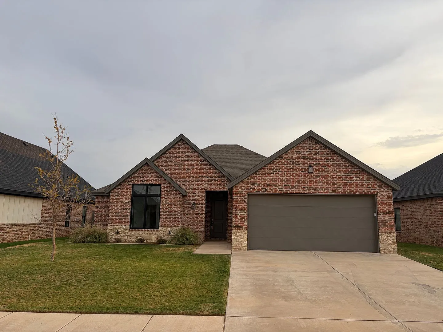Spacious 4-Bedroom Home with Open-Concept Living & Covered Patio — Photo 1