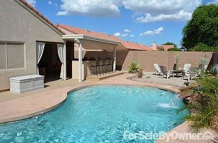 Swimming Pool
						:
						View from west to east of pool, waterfall & outdoor kitchen