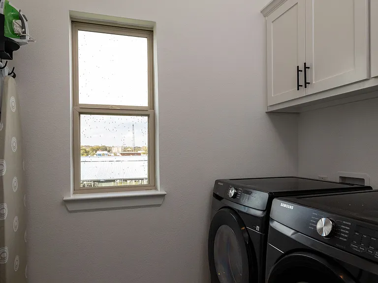 Washer, dryer, iron, and ironing board available for use!