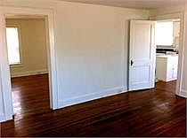 View from livingroom to kitchen and bedroom