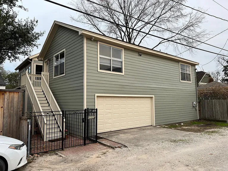 Exterior view of the apartment and garage.