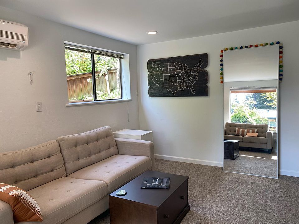 Living room with wall mount heat pump / AC