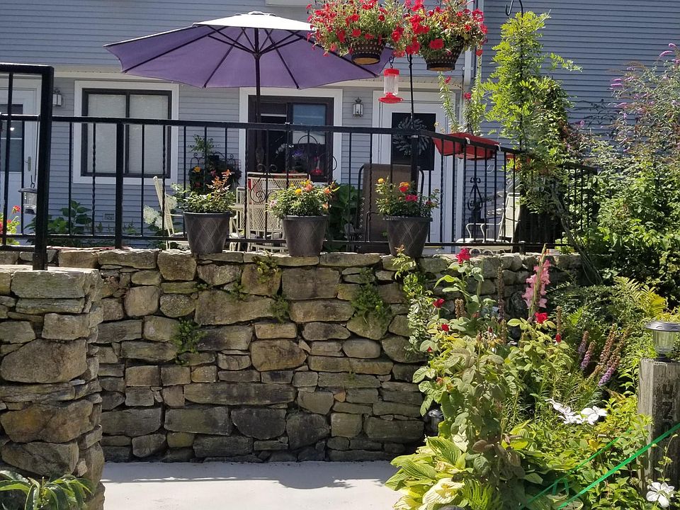 Front entrance and patio. Bring few lounging outdoor chairs and grill. Grill must be position away from the property sidings and entrance for safety.