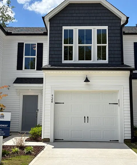 One car garage + one car pad parking