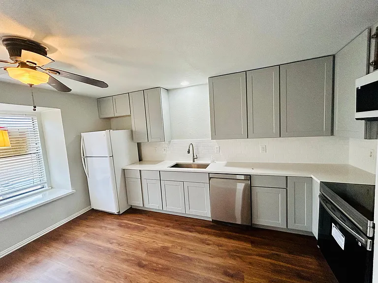 New oversized kitchen shaker style cabinets, new appliances, new flooring, new paint, new LED lights