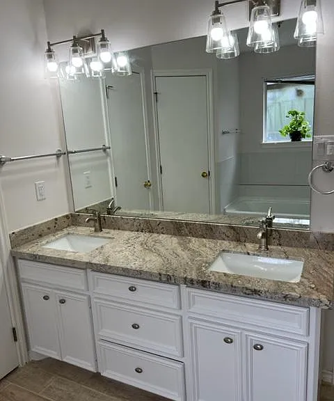 master bathroom granite counters, new sinks, mirror and lighting