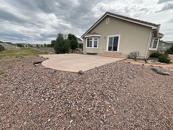 Outdoor patio for entertaining with beautiful views of Pikes Peak and Mt. Herman!
